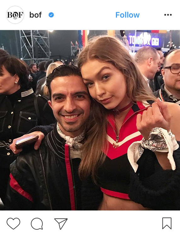 Model Gigi Hadid, face of Calvin Klein, poses with Business of Fashion founder Imran Amed